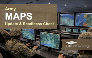 U.S. Army personnel work at computer stations in a modern operations control room, with large wall screens displaying tactical maps and data.